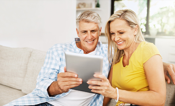 Couple watching BMT property depreciation webinar