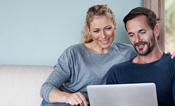 Couple watching BMT property depreciation webinar