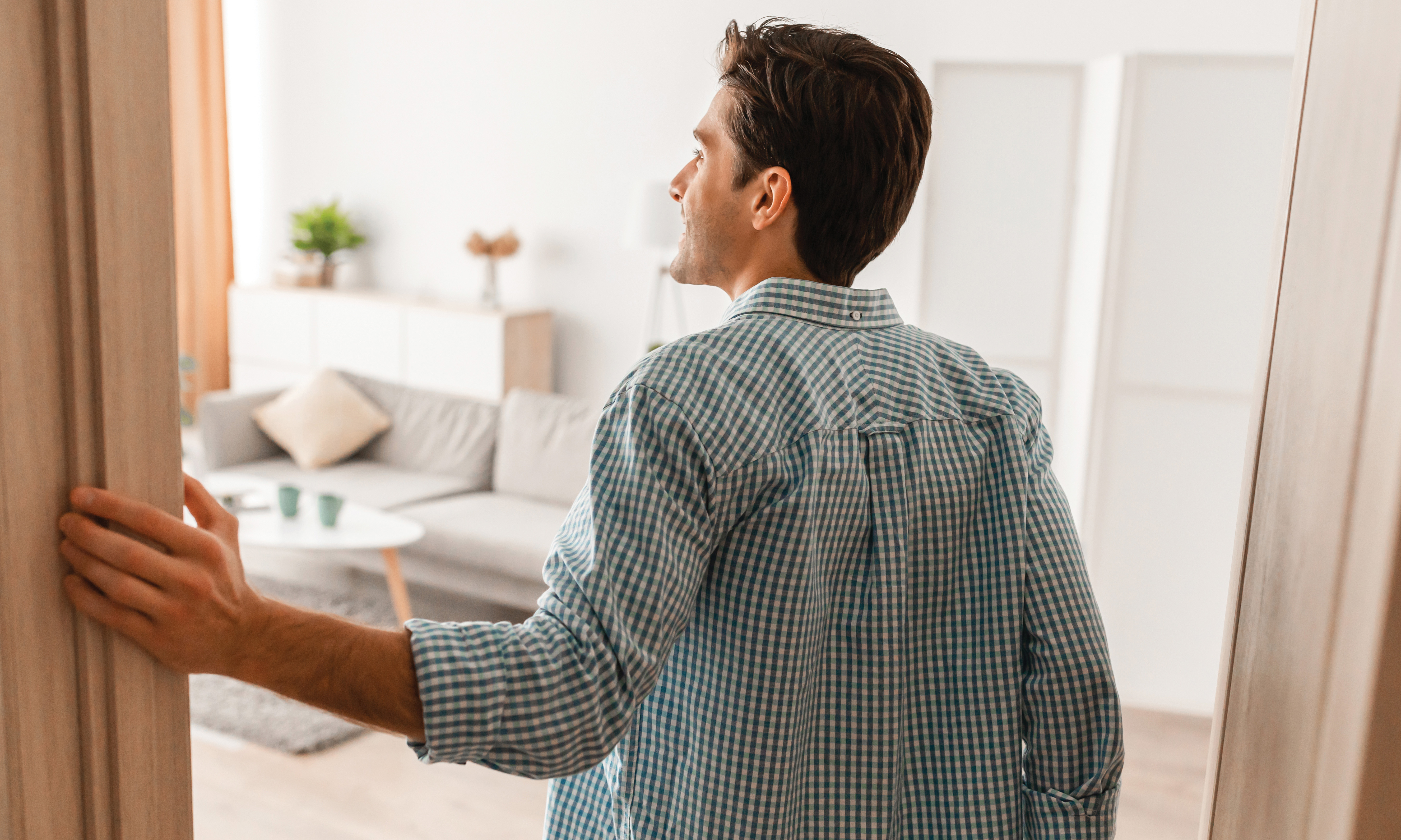 tenant walking into build to rent apartment