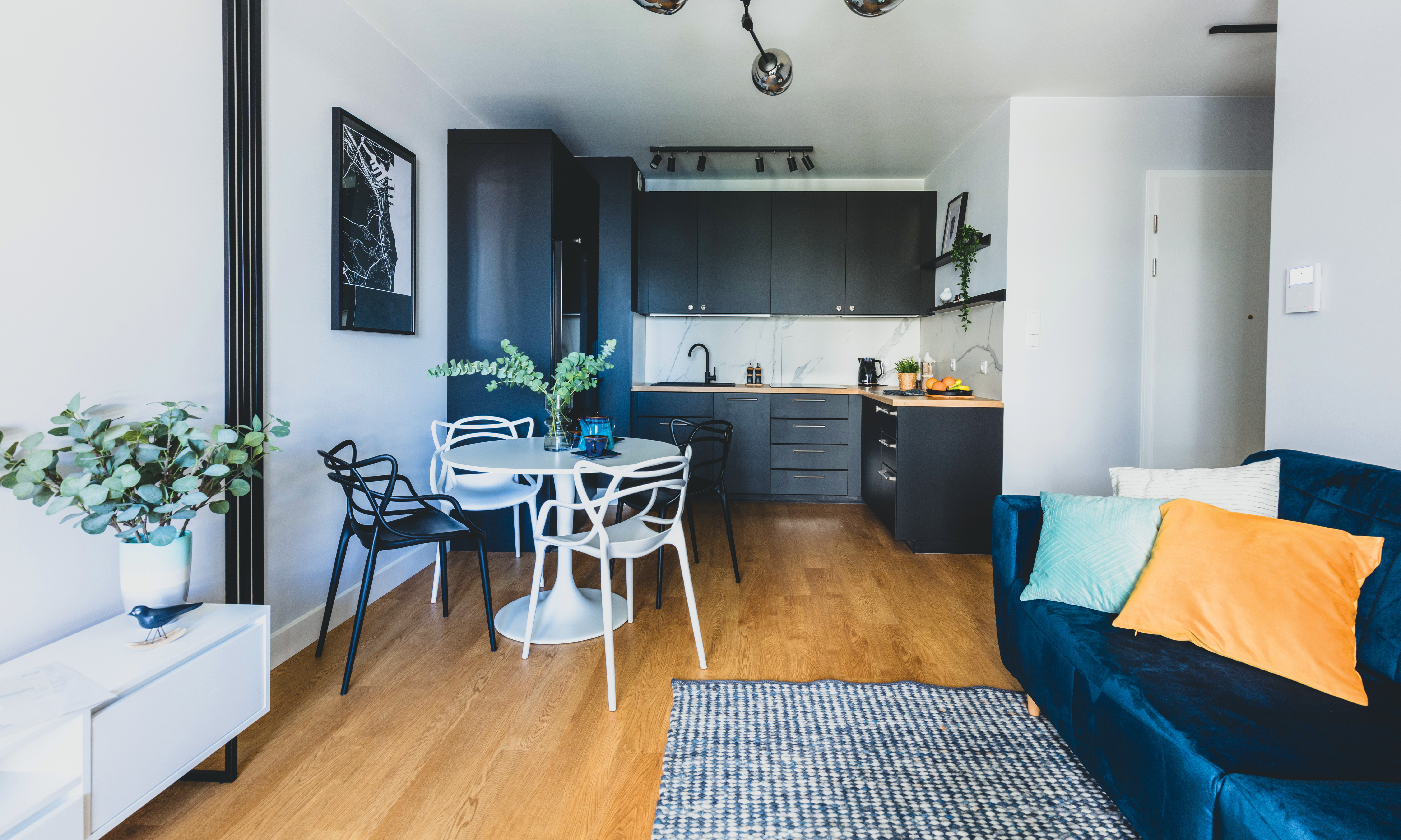 modern build to rent apartment interior with open plan kitchen, dining and living room