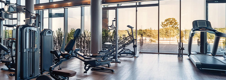 interior shot of exercise equipment assets inside a fitness centre