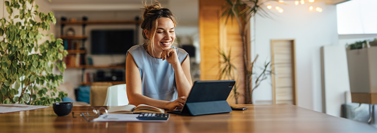 Property investor reviewing depreciation schedule on tablet