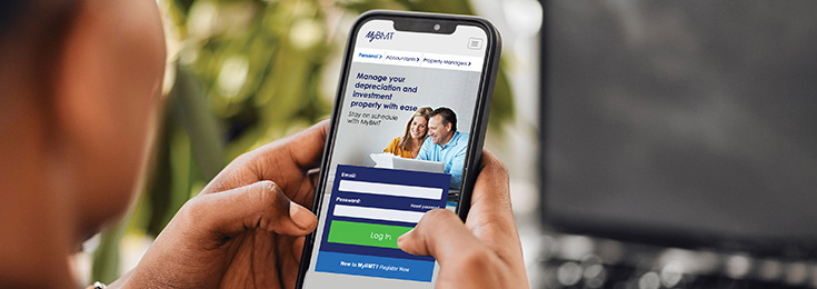 Property investor logging into MyBMT on a phone