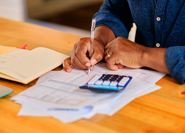 Filling in forms with pen and calculator