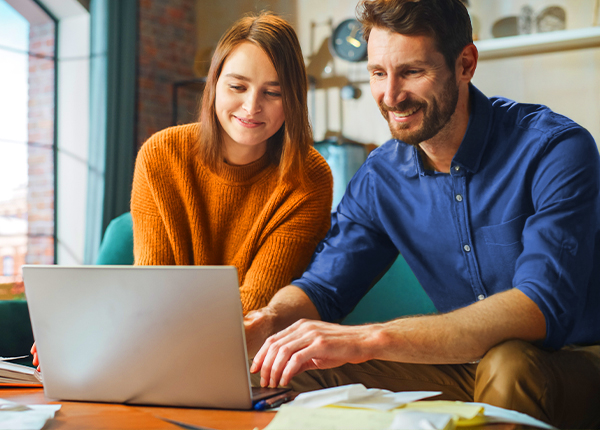 Dad helping daughter to complete tax return