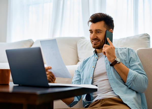 Man talking on phone about quarantined property losses