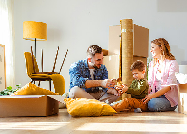 Happy property tenants just moving into their new home